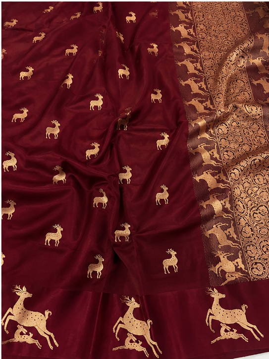Plum Banarasi Handloom Mashru Silk Saree featuring authentic Kaduwa weaving, intricate gold zari deer and animal motifs, a rich traditional Banarasi pallu, Silk Mark Certified pure silk, dyeable to your choice of colors, and a matching running blouse piece, perfect for weddings and festive occasions.