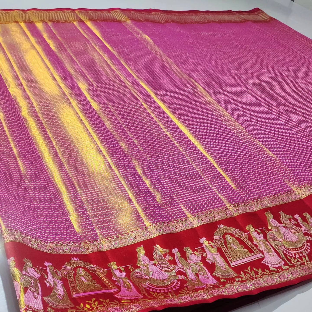 Rani Pink Kanchipuram handloom double warp tissue brocade silk saree with intricate Kalyana Pallakku motifs and a grand rich border.