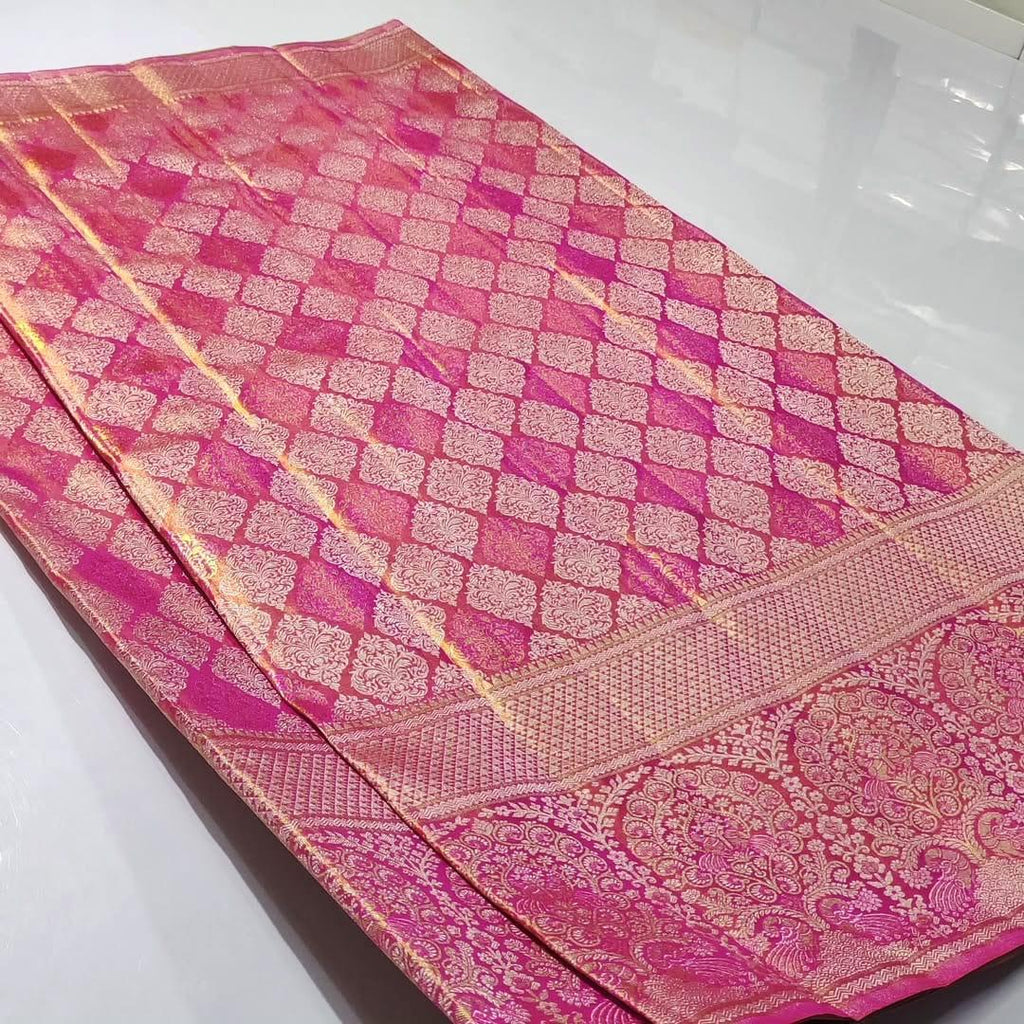 Hot Pink Kanchipuram Tissue Silk saree featuring intricate Meena work and golden floral brocade.
