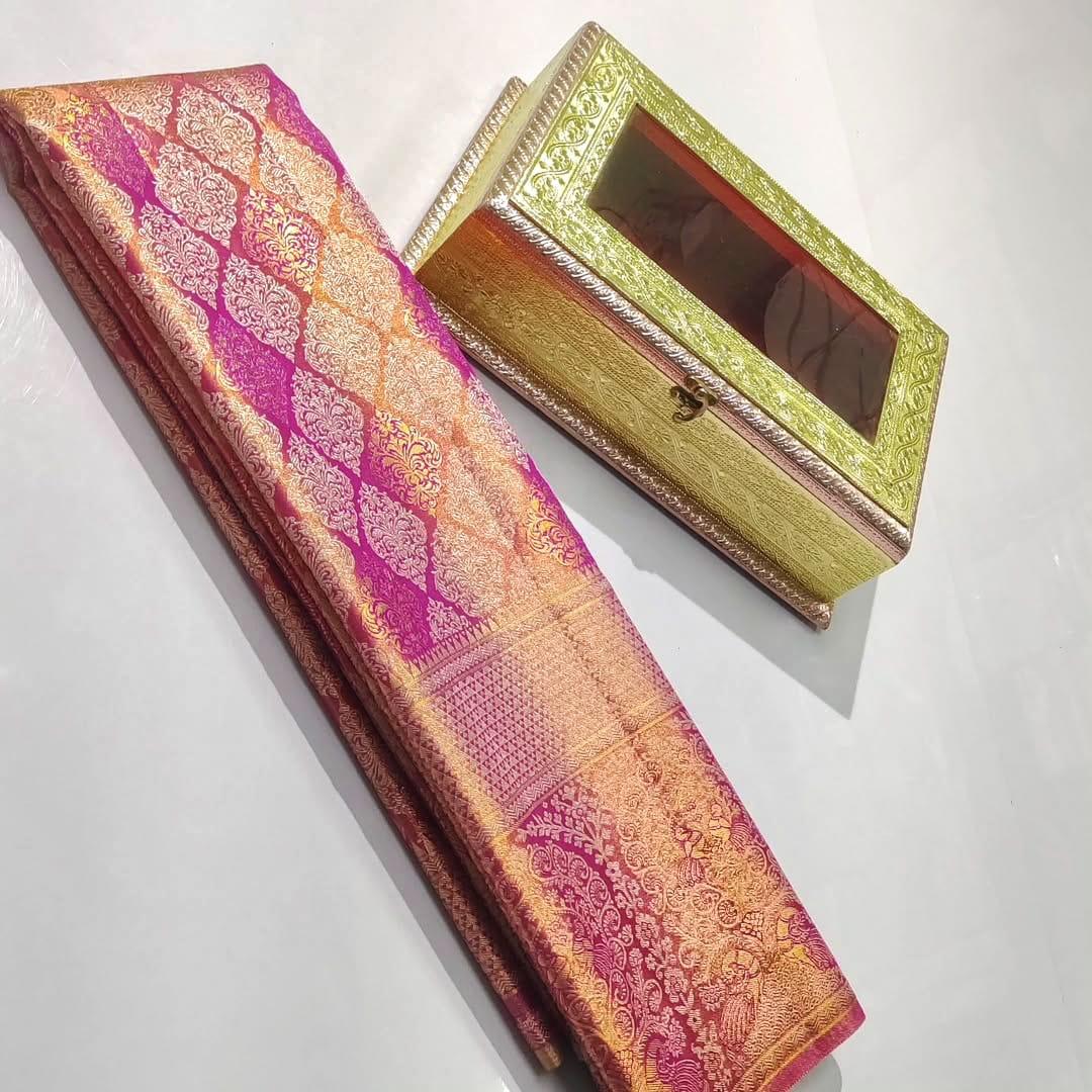 Hot Pink Kanchipuram Tissue Silk saree featuring intricate Meena work and golden floral brocade.
