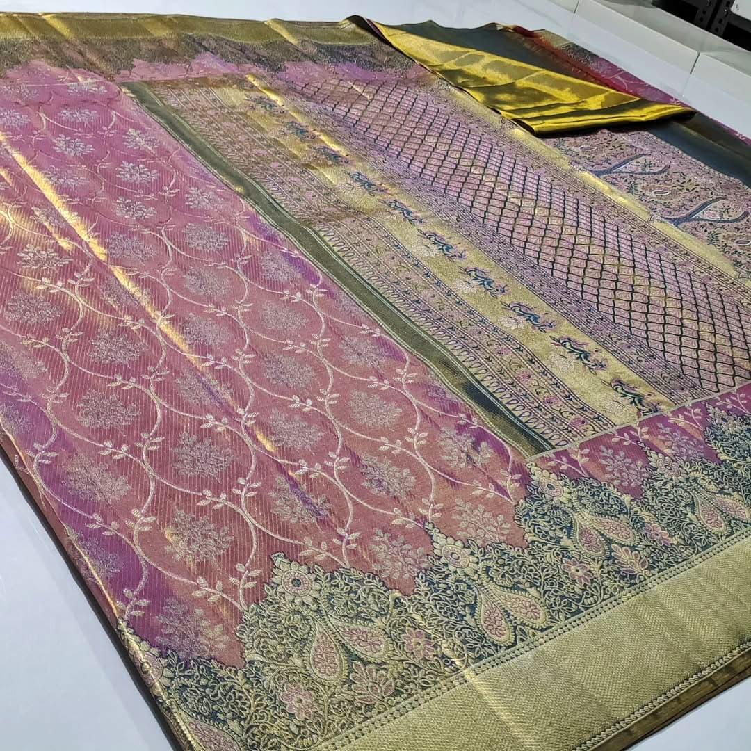 A luxurious Lavender Kanchipuram Handloom Tissue Brocade Silk saree with intricate gold floral patterns and colorful Meenakari detailing throughout the body and pallu.