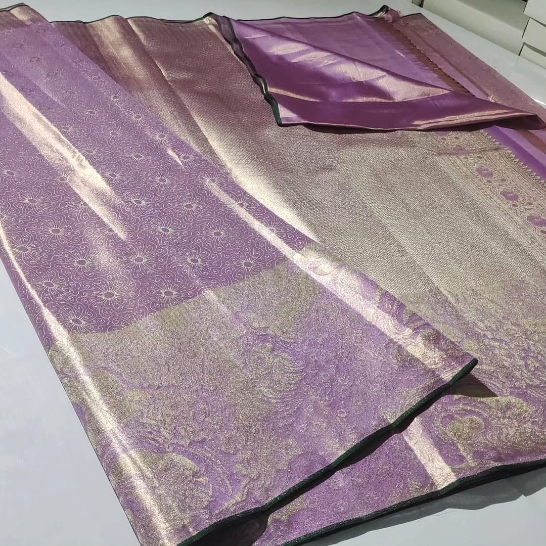 Lavender Kanchipuram Handloom Tissue Silk Saree with all-over silver brocade and vibrant Meenakari floral design.
