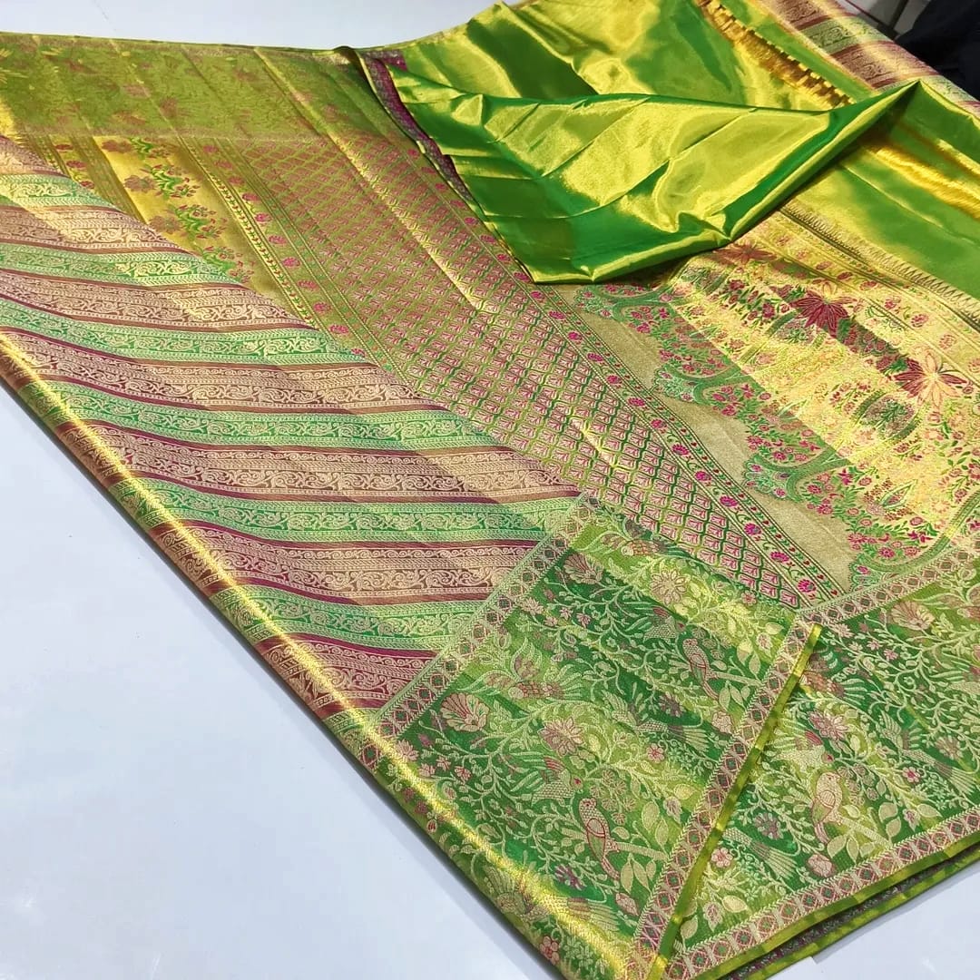 Green Kanchipuram handloom tissue brocade meenakari silk saree featuring diagonal floral stripes and traditional bird borders