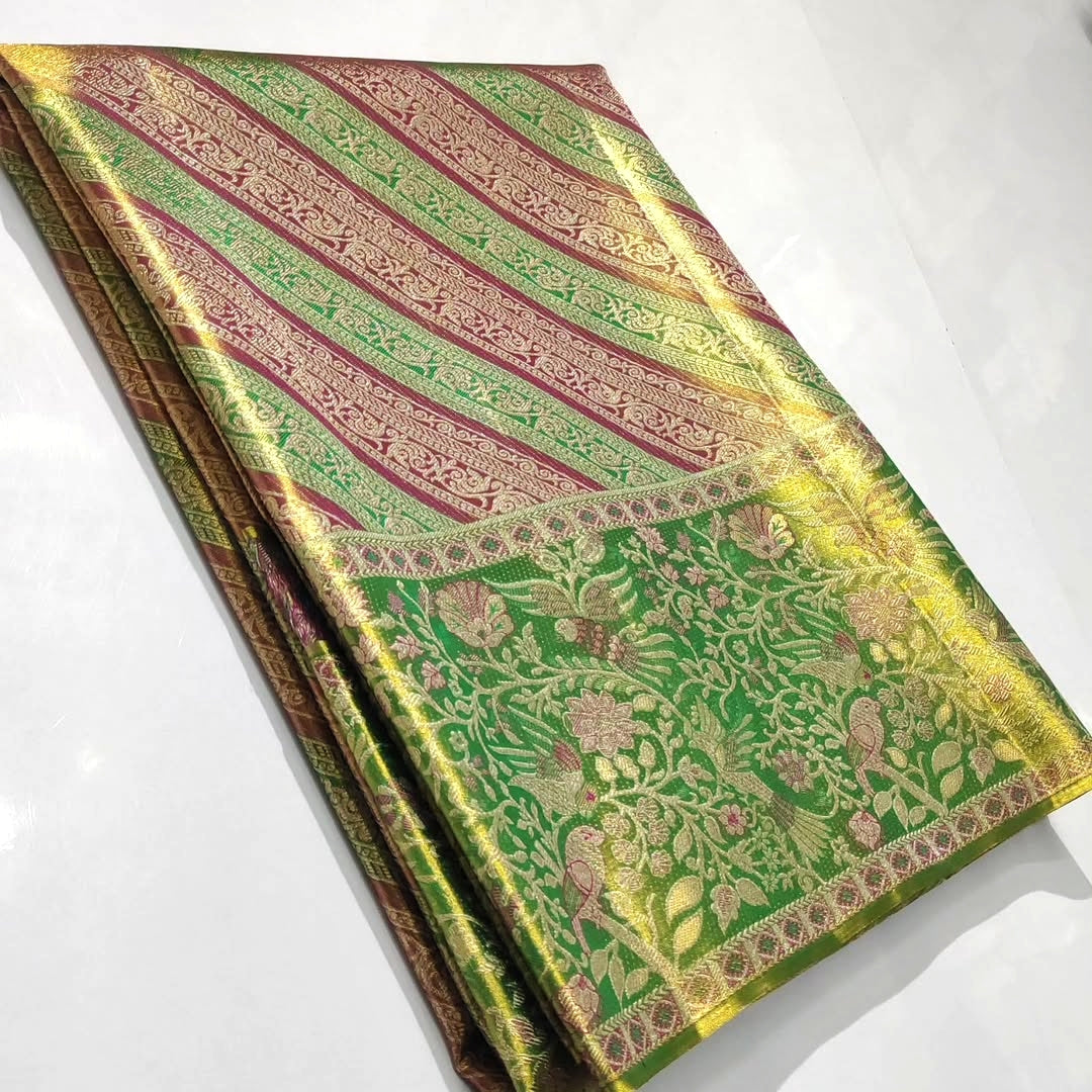Green Kanchipuram handloom tissue brocade meenakari silk saree featuring diagonal floral stripes and traditional bird borders