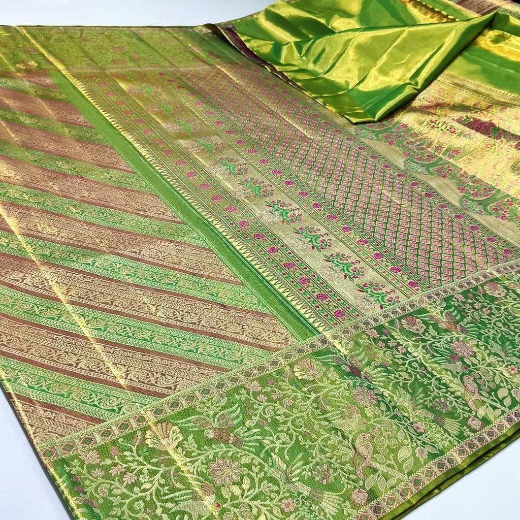 Green Kanchipuram handloom tissue brocade meenakari silk saree featuring diagonal floral stripes and traditional bird borders