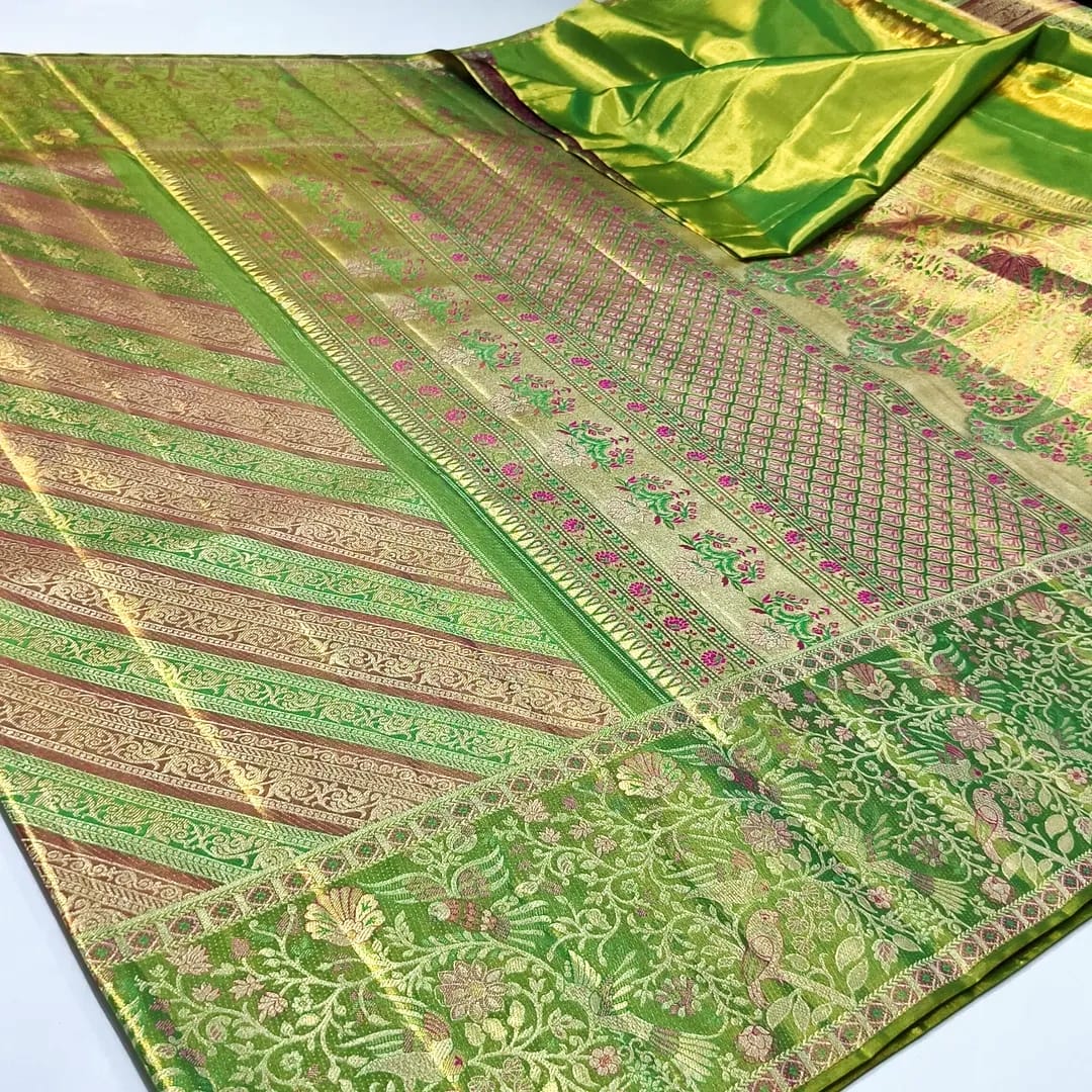 Green Kanchipuram handloom tissue brocade meenakari silk saree featuring diagonal floral stripes and traditional bird borders