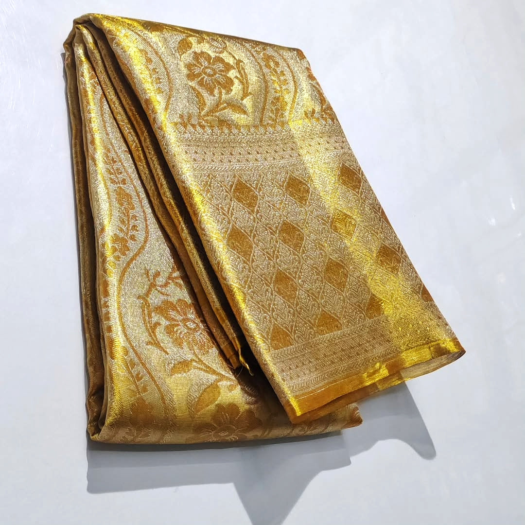 Stunning Gold Kanchipuram handloom tissue brocade silk bridal saree with rich zari work and intricate traditional borders.