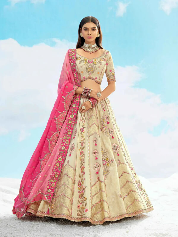 Pastel Beige Pink Bridal Lehenga with Fine Detailing