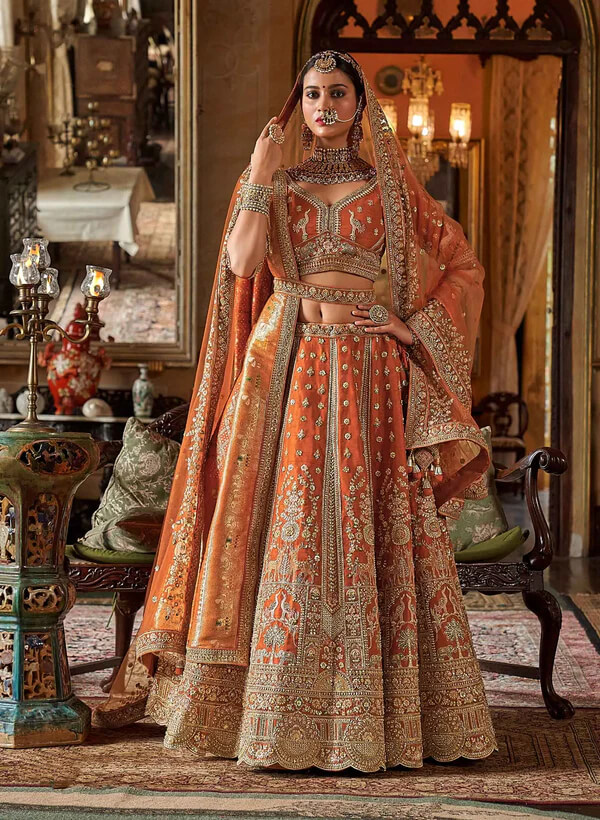 Designer Orange Lehenga Choli with Heavy Embroidery & Pearls