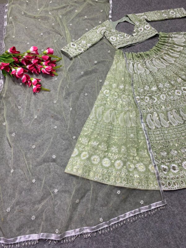 Pastel Green Designer Lehenga Choli With Dori and Heavy Sequins Work in Faux Georgette