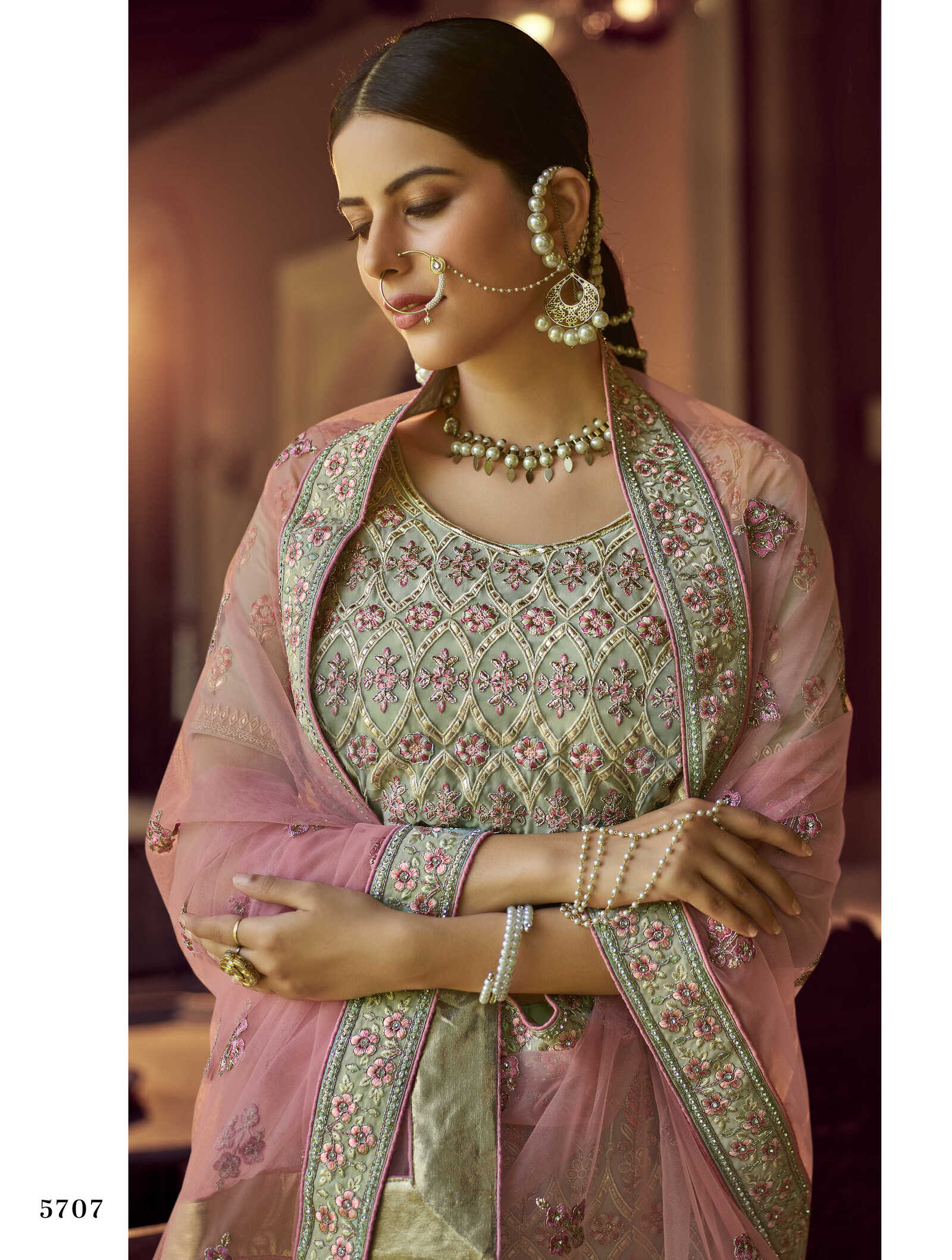 Photo of A bride in a light pink lehenga with gold and green jewellery | Lehenga  jewellery ideas, Bridal jewellery inspiration, Indian bridal photos